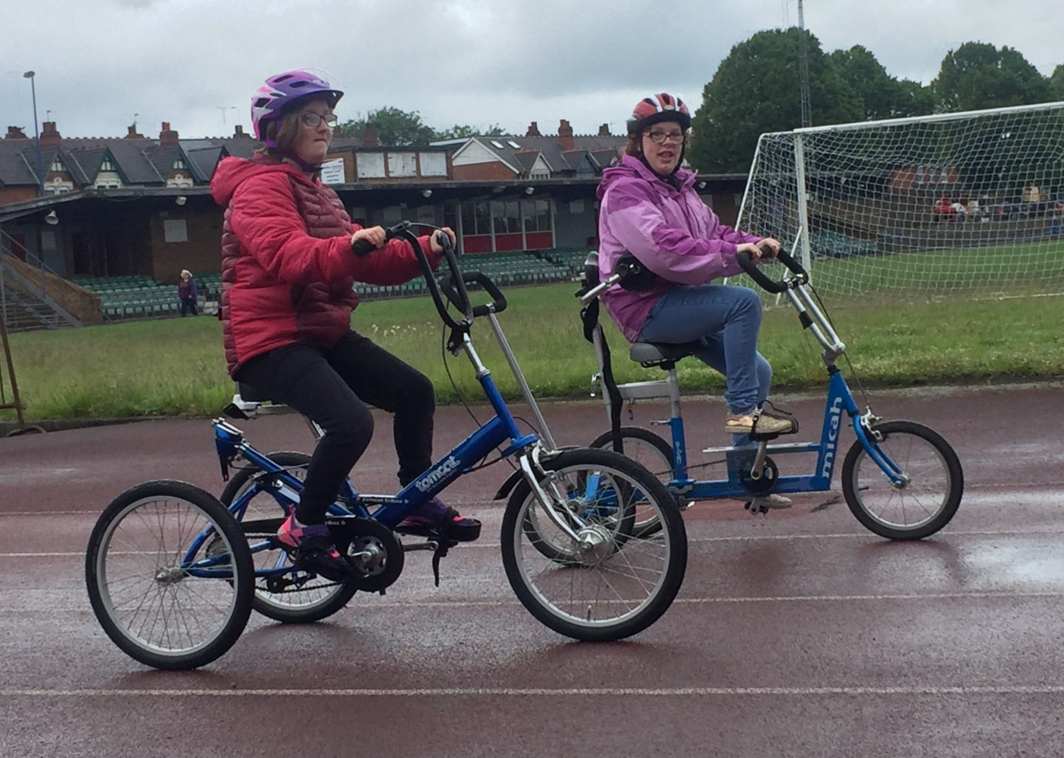 Riding adapted disabled bike on the track