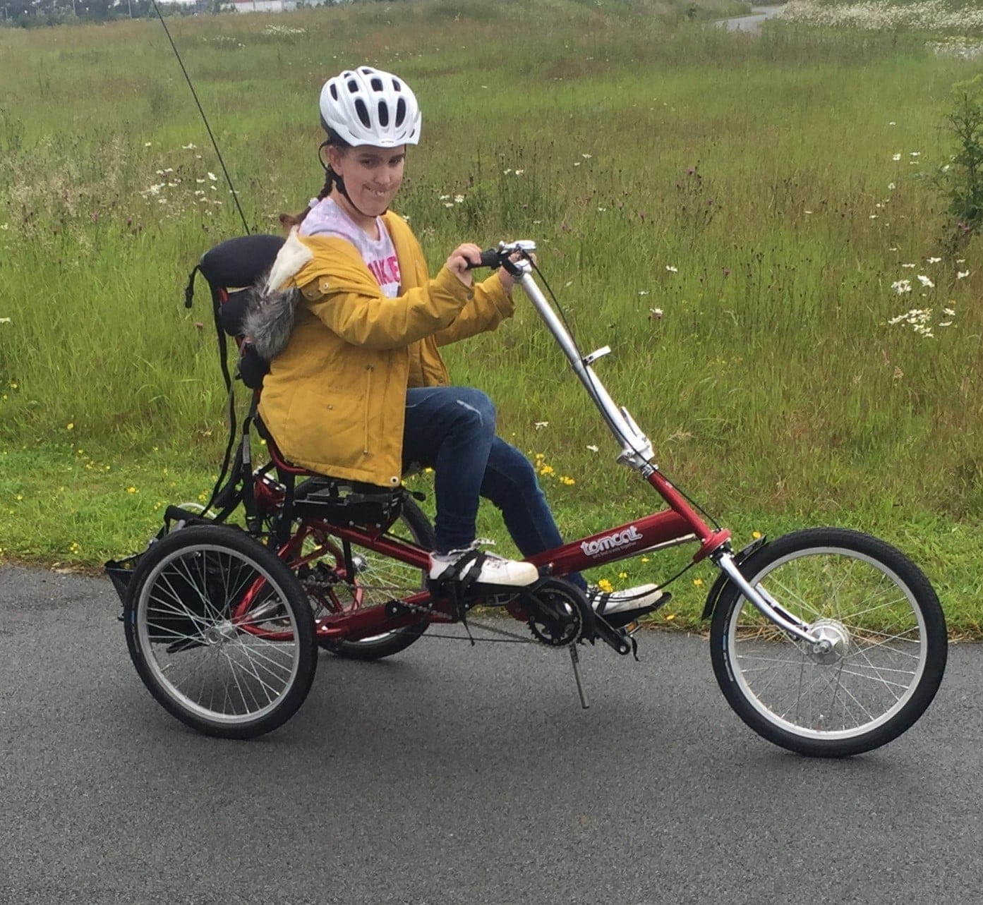 Riding adapted cycle in the park