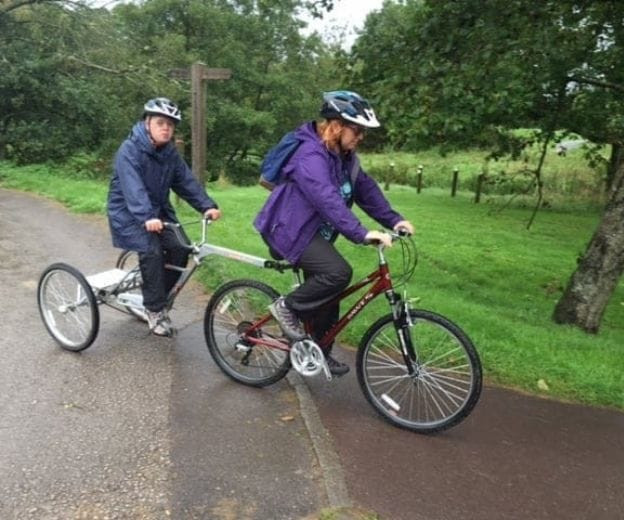 Adapted bike ride in park