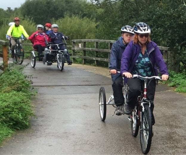 Adapted bike ride in park